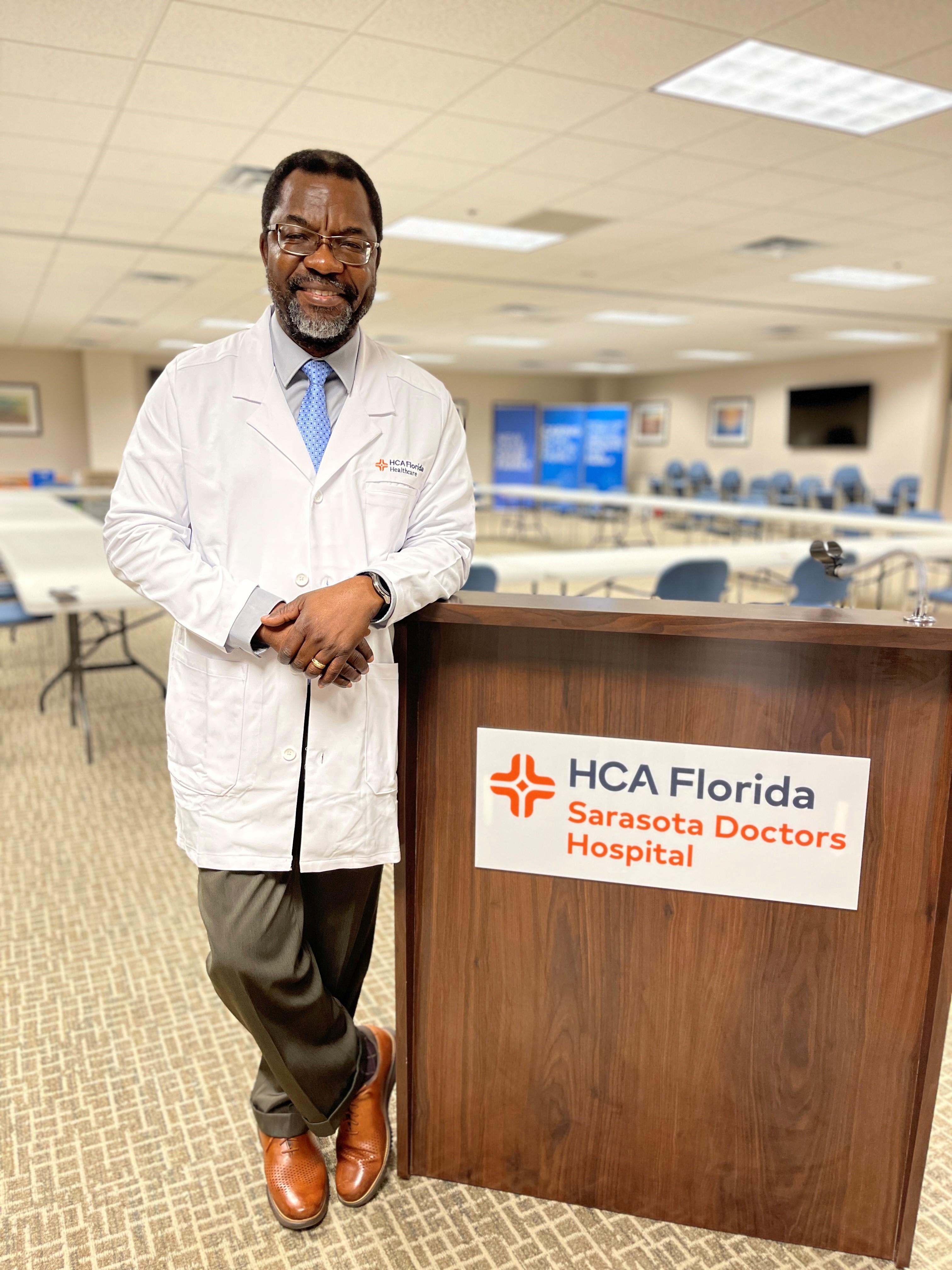 Michael Schandorf-Lartey MD in meeting room at HCA Florida Sarasota Doctor's Hospital.