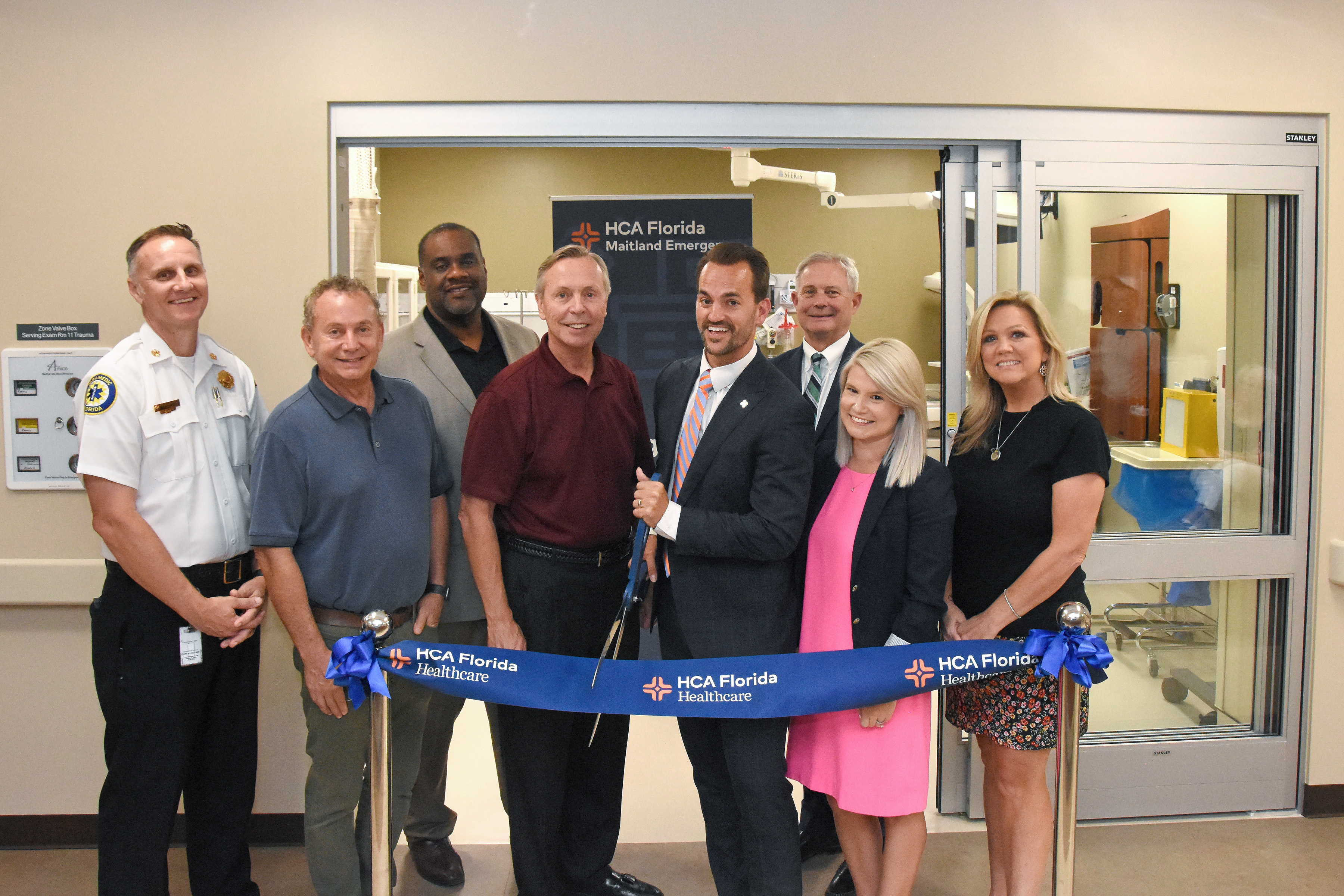 From left to right: Maitland Fire Chief Chris Morton; Mark Wechsler, PA; Board Members Jeffrey B. Campbell and Rep. David Smith; Chief Nursing Officer Joseph Everette; Chief Medical Officer Bob Shaver, MD; ER Director Taylor Dark and ER Manager Susan Miller cut the ceremonial ribbon marking the opening of the HCA Florida Maitland Emergency.