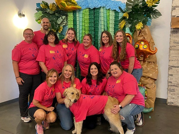 Wesley Children's staff members with therapy dog.