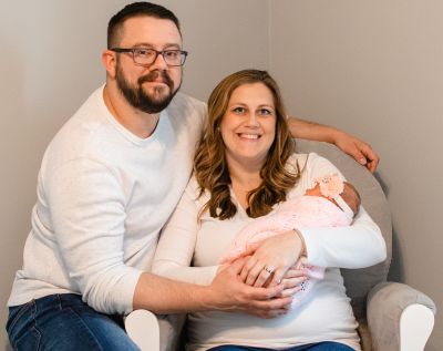 Katelyn Churchill, with her husband and baby Charlotte.