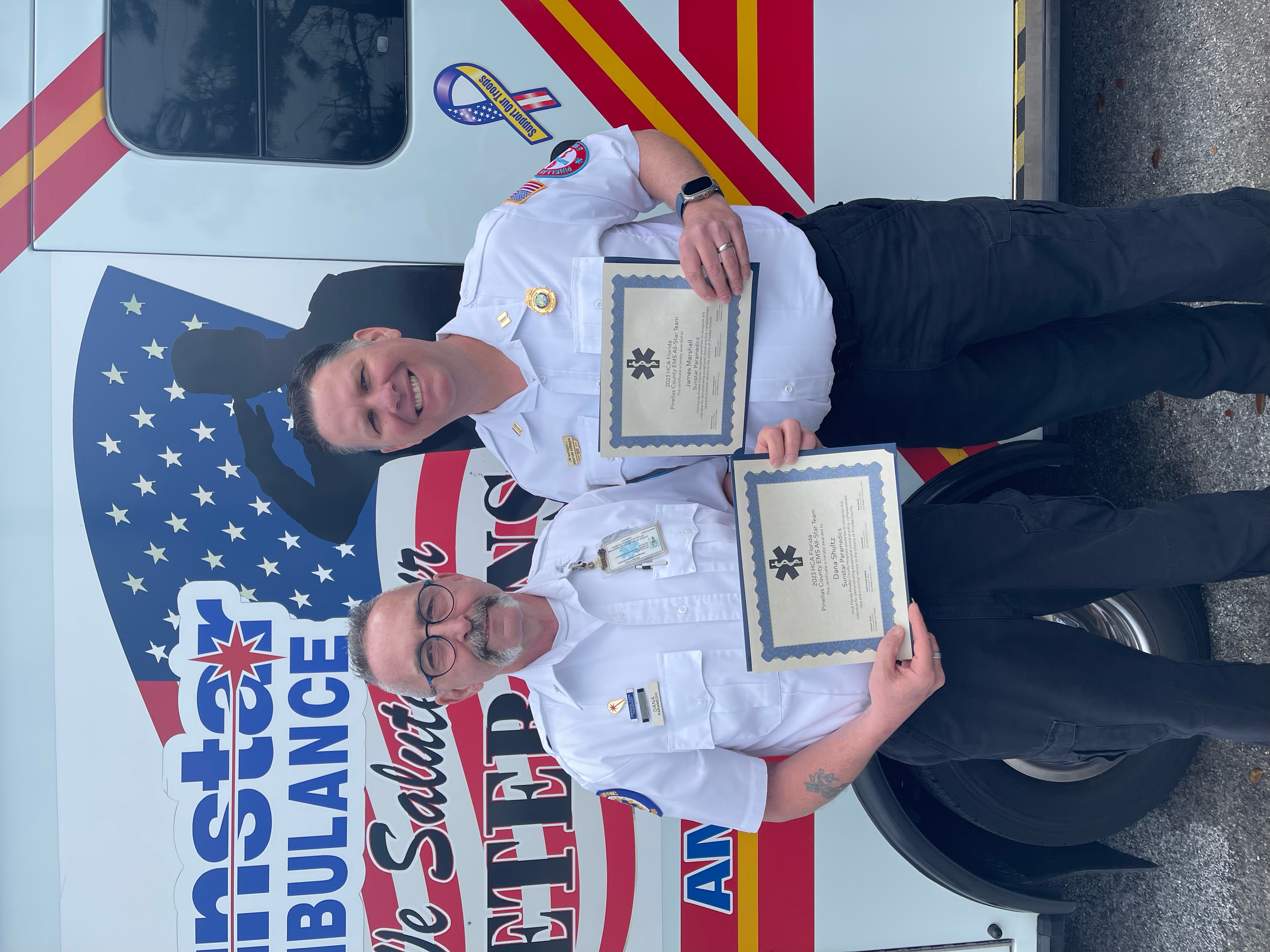 Dana Schultz and James Marshall of Sunstar Paramedics holding their awards