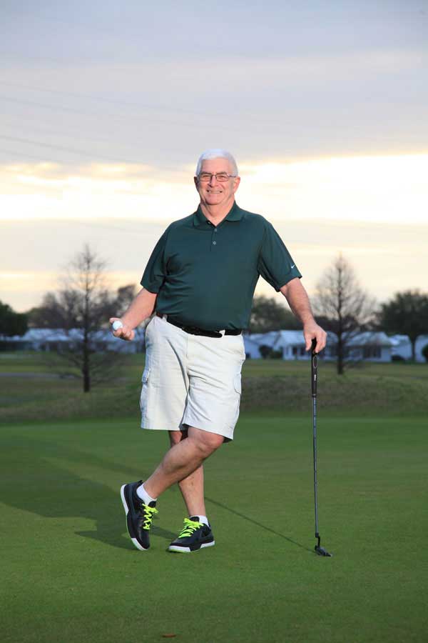 David Bonds posing on a golf course