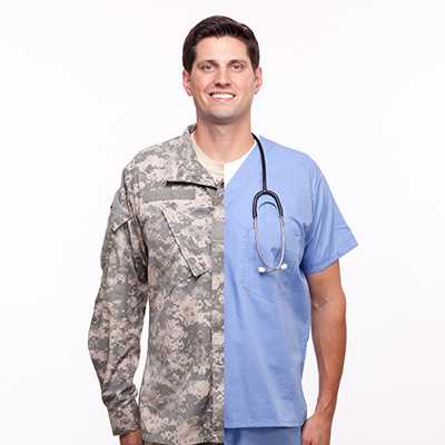 Man wearing half of soldier uniform and half of hospital scrubs.