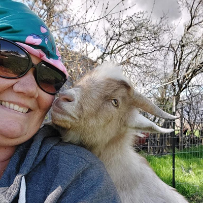 Jasmine Linam with her pet goat.