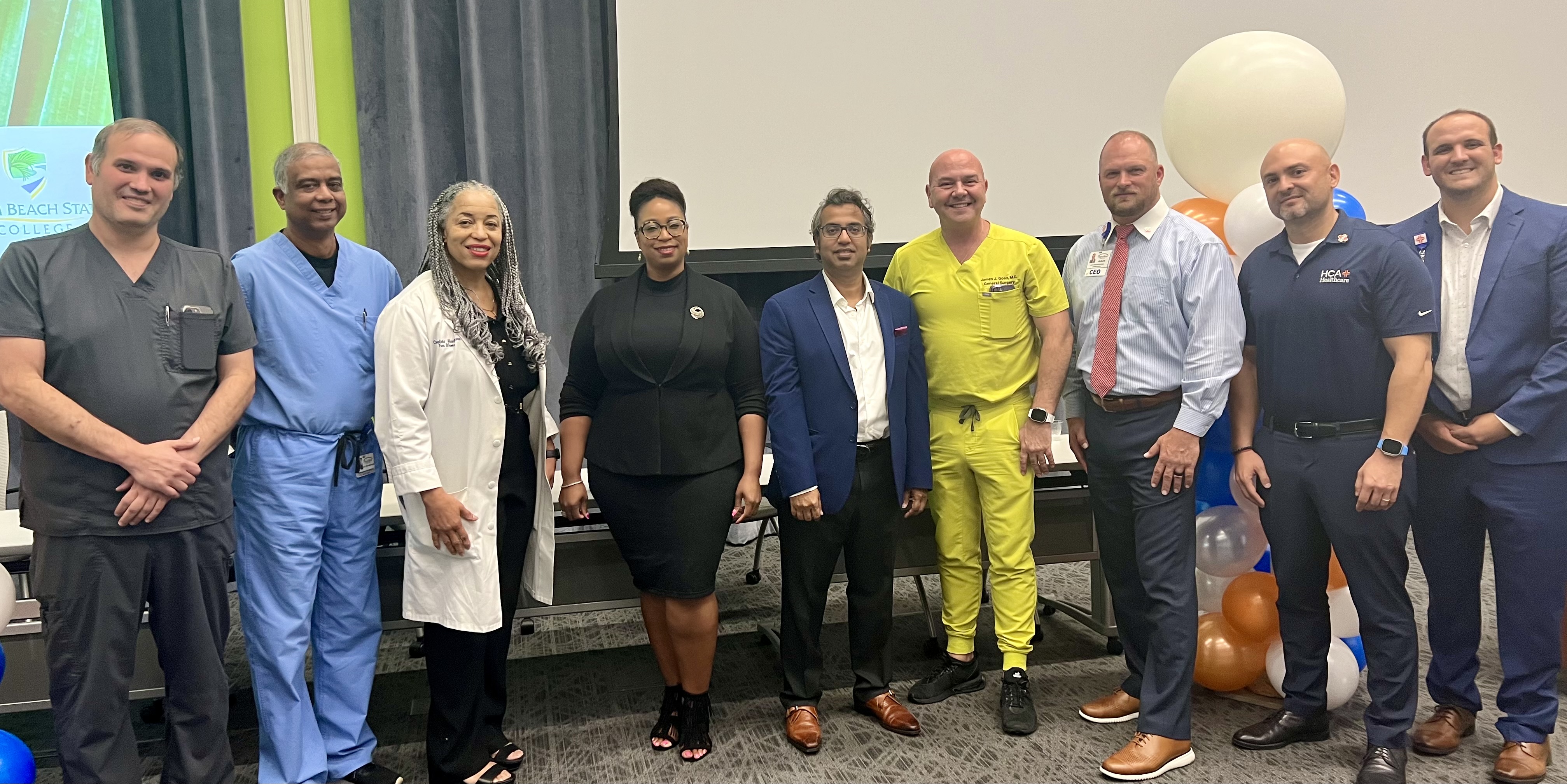 Group Photo: Dr. Fred Muhletaler, Dr. Arul Chidambaram, Dr. Colette Brown-Graham, Dr. Aliese Smith, Dr. James Goad, CEO Jason Kimbrell, Chief Medical Officer Alex Gumiroff and Chief Operating Officer Jamison Robinette pose after a panel discussion on Robotic surgery