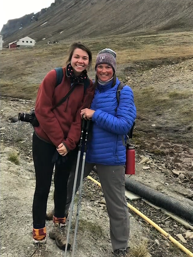 Meg and her daughter pause to smile for the camera while hiking across Norway.