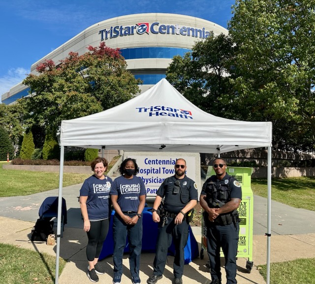 TriStar Centennial Crush the Crisis volunteers at drop-off table