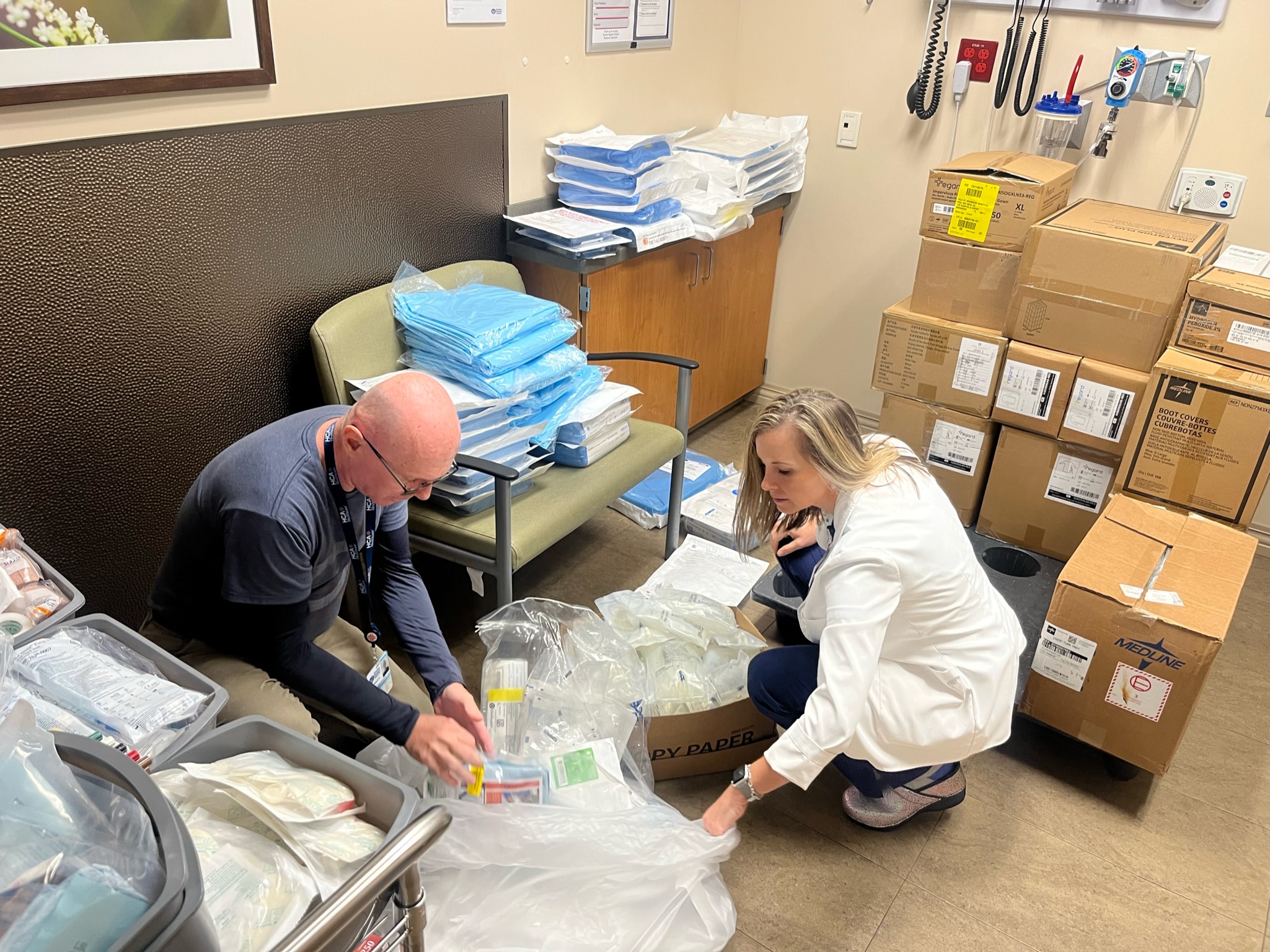 Brandon Hospital physician and volunteers pack medical supplies to donate overseas