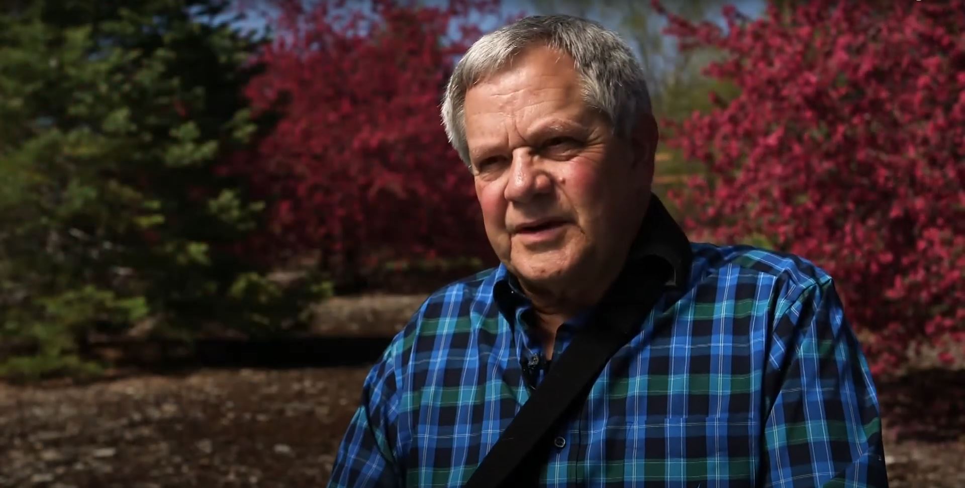 Dean Story discusses his care at Presbyterian/St. Luke's Medical Center while sitting in a garden.