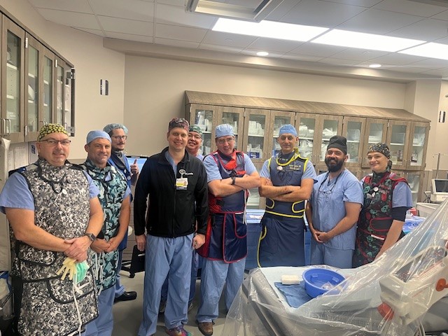 Dr. Saurabh Sanon, Dr Michael Gillespie, and the cath lab team at HCA Flor