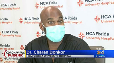 Screen capture of a news broadcast featuring Dr. Charan Donkor.