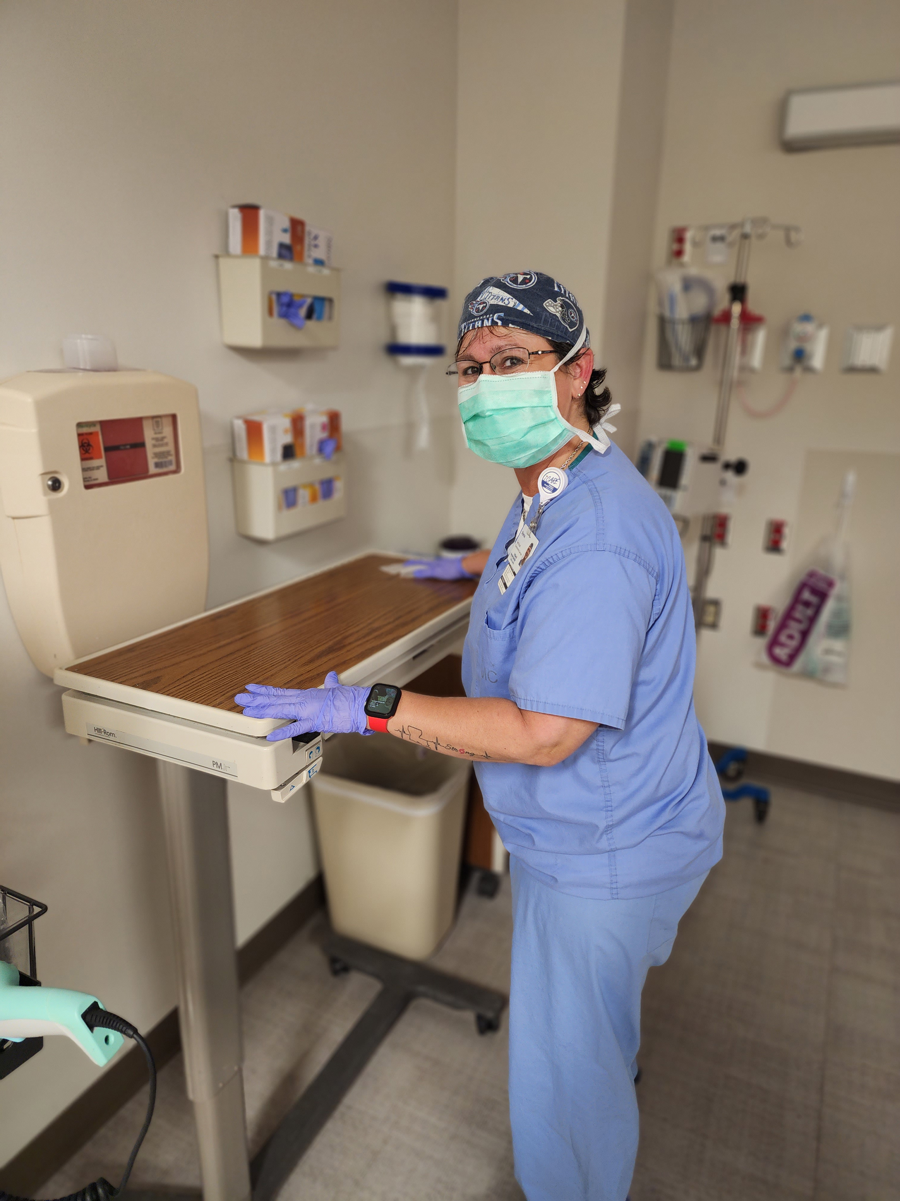 Sharon Hebert, a housekeeper in Environmental Services at TriStar Hendersonville, cleans a room in the PACU (post anesthesia care unit).