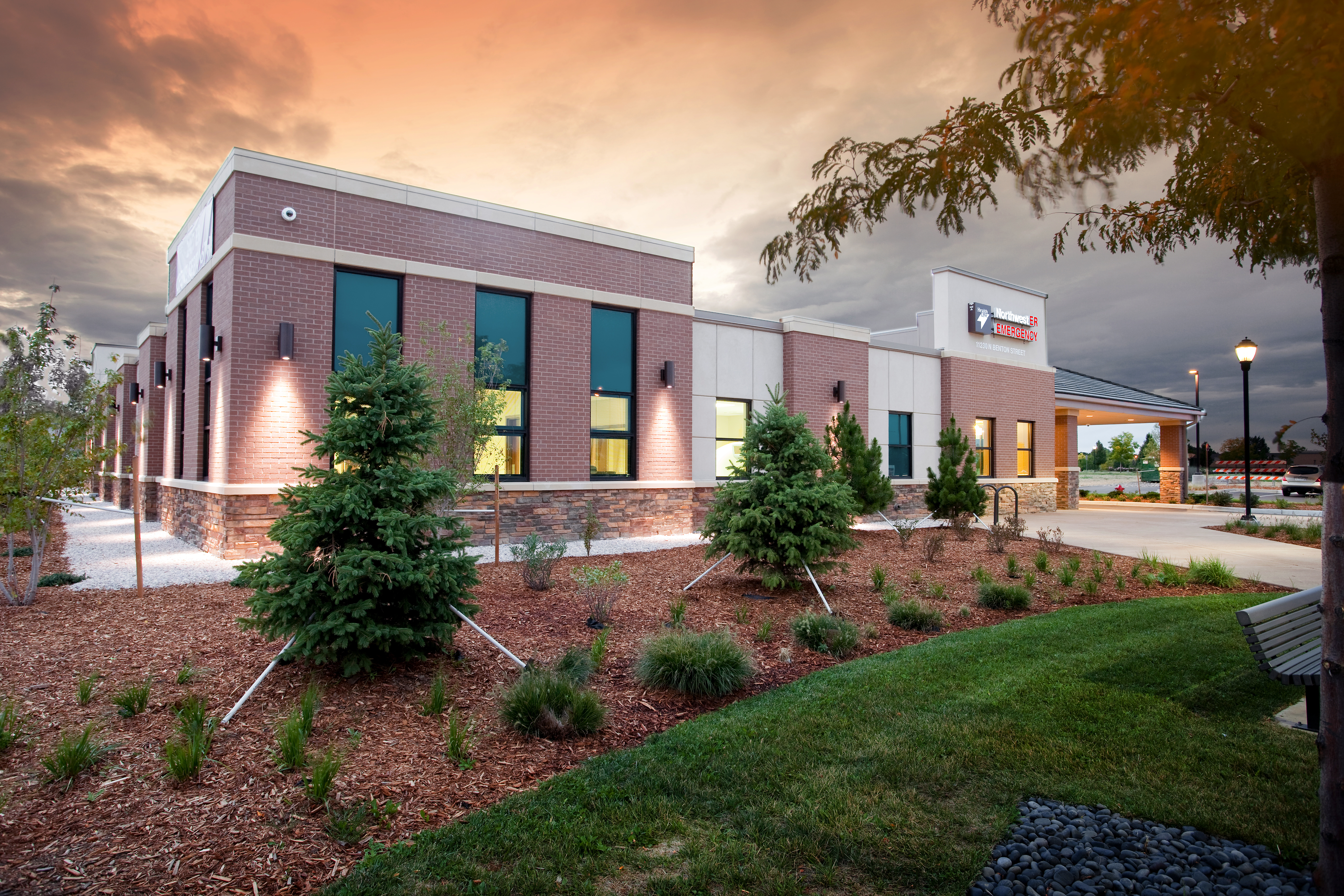 Exterior view of North Suburban Behavioral Health and Wellness at dusk. 