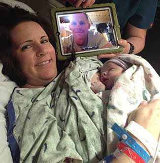 Amanda Toronto soon after giving birth, with her newborn baby boy.