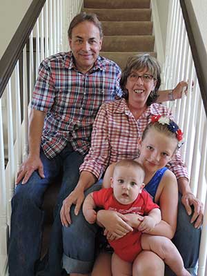 Stroke survivor Gary Brown with his wife and family.