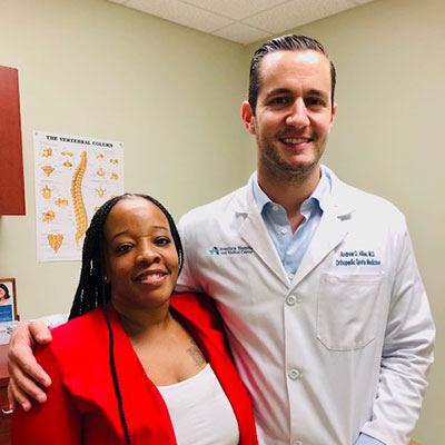 Kendra Rolle with Orthopedic Surgeon Dr. Andrew Hiller.